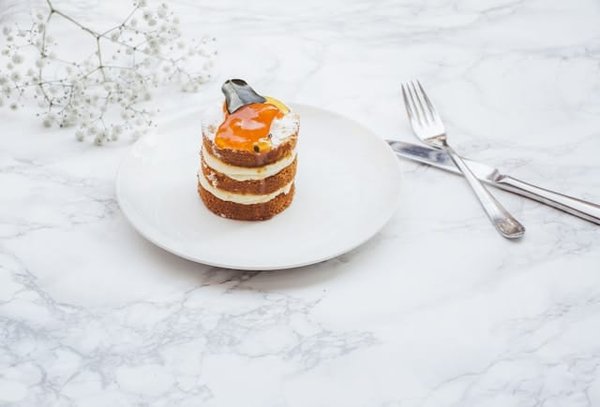 How to Achieve the Perfect Texture in a Gourmet Carrot and Pine Nut Cake?